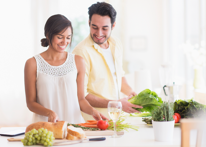 Woman and man making healthy meal